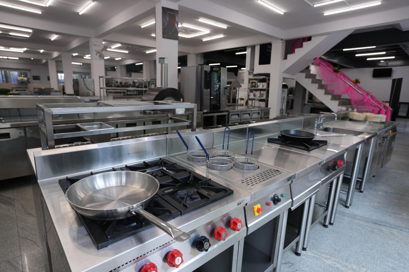 KitchenWhiz showroom with burner ranges and cooking lines